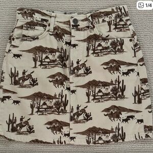 Reformation western cowboy print mini skirt size 24 (brown and white)​